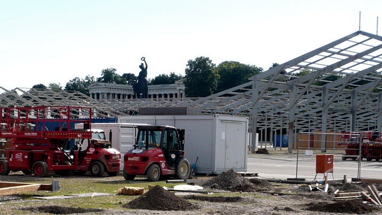 Tent frames on the Theresienwiese, with the Bavaria statue; not the busy 2026 festival
