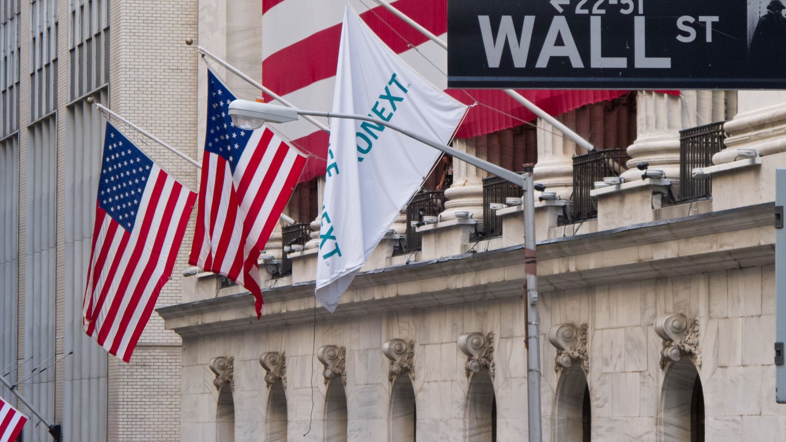 New York Stock Exchange facade, 2012, with an ICE Next flag; not Friday’s session