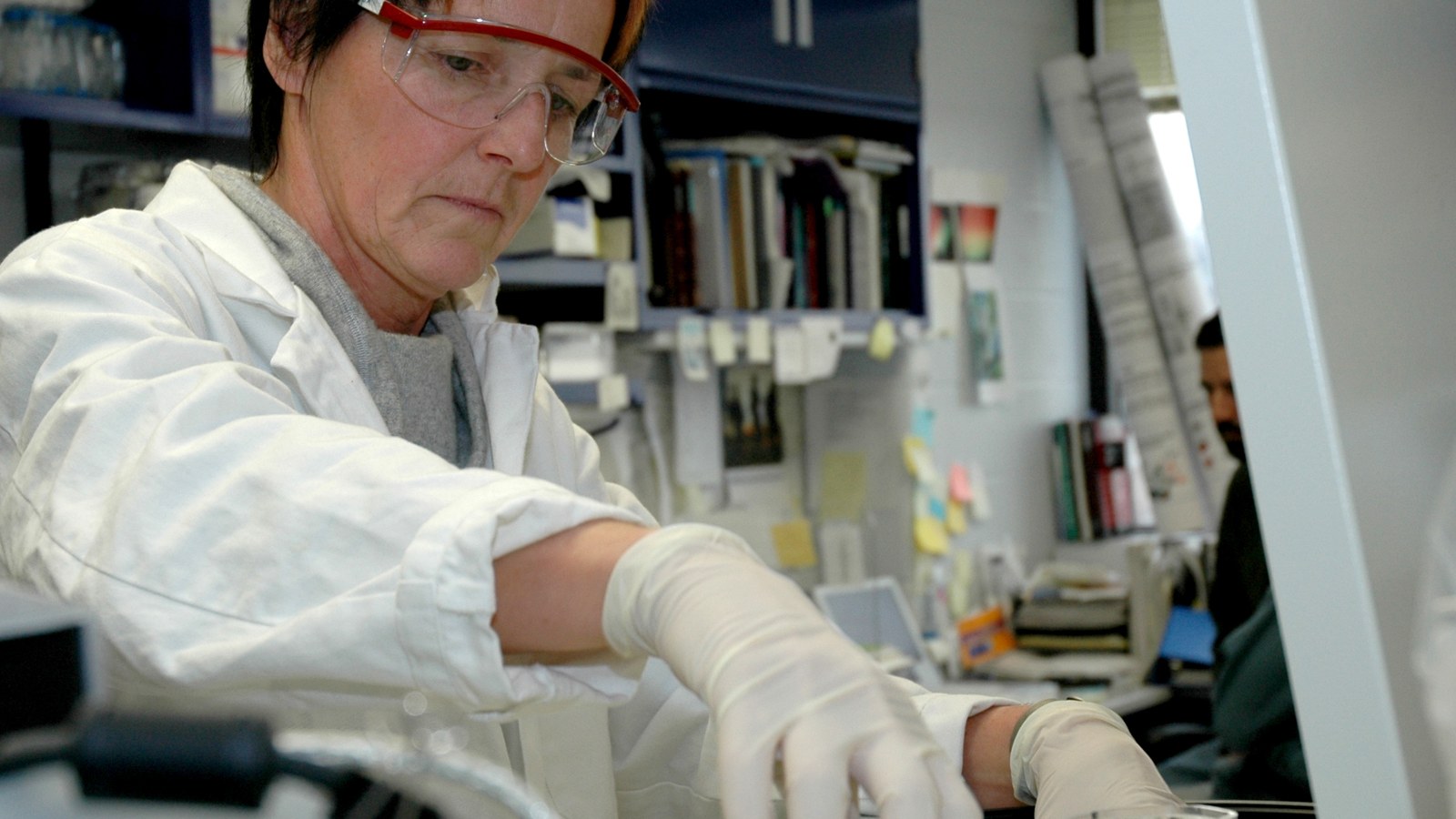 A researcher in an NIH laboratory; an archive frame, not Xenon’s 2026 trials