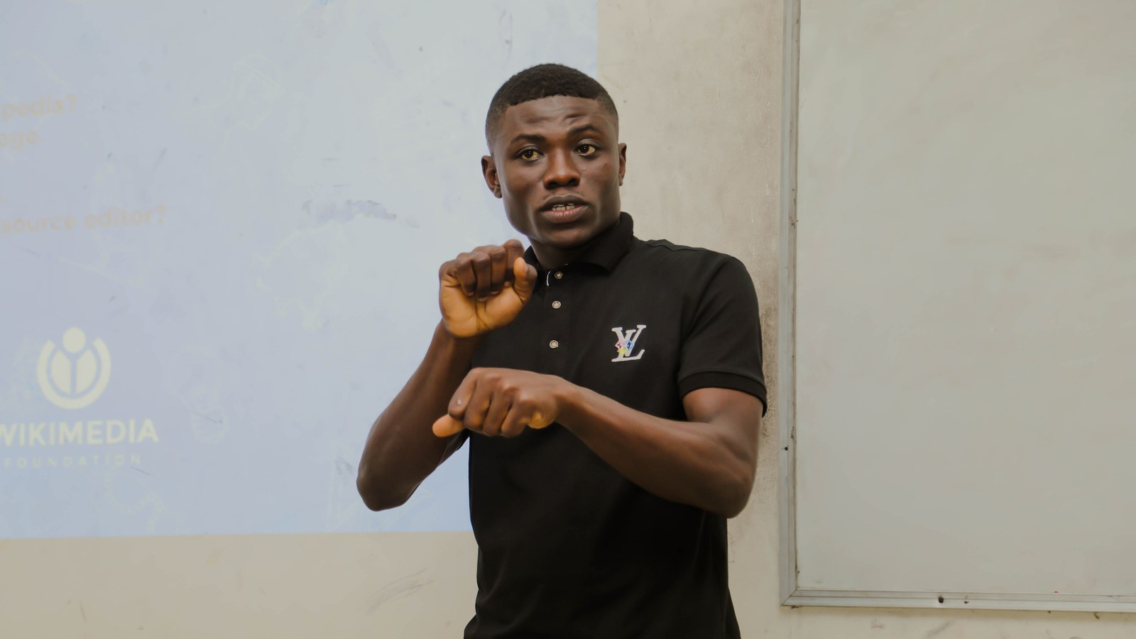 Sign-language interpreter in Winneba, 2022; not the 2026 UN observance