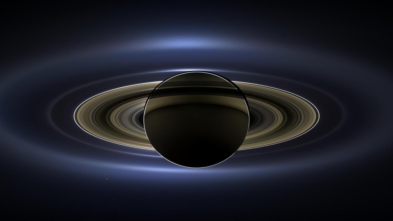 Saturn fotografiat de Cassini, iluminat din spate de Soare (imagine de arhivă, nu din simpozionul NIAC 2026)
